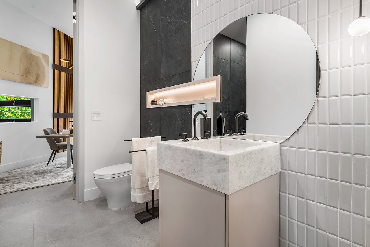 Custom-cut glass mirror installed by RG Glass
