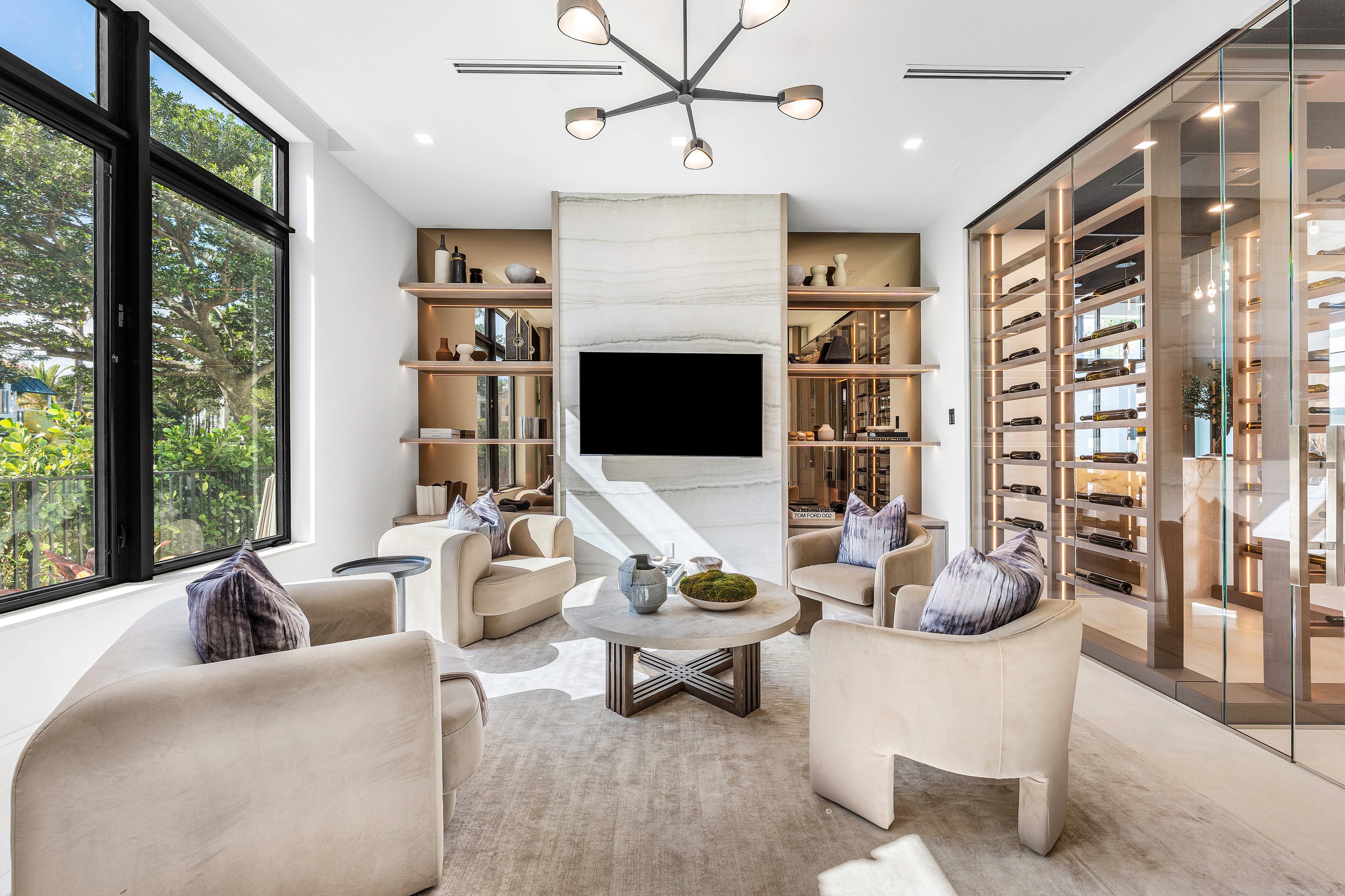 Glass-enclosed wine room by RG Glass