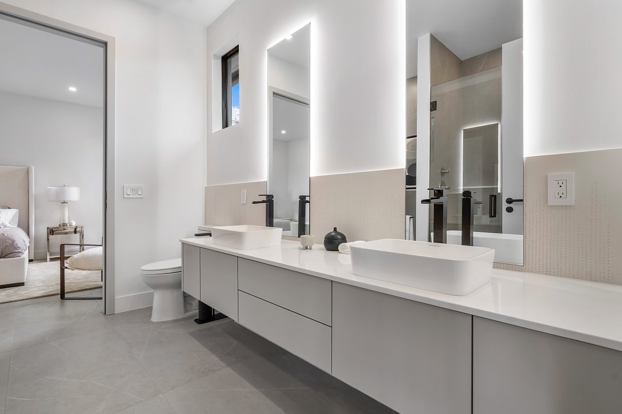 Custom-cut glass mirror installed by RG Glass