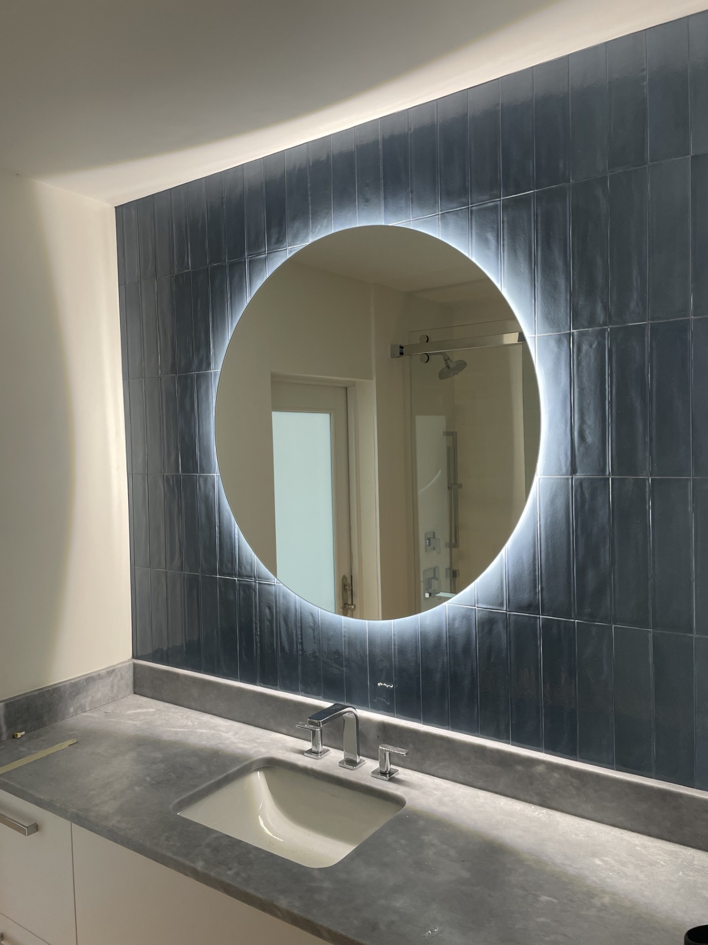 Custom-cut glass mirror installed by RG Glass