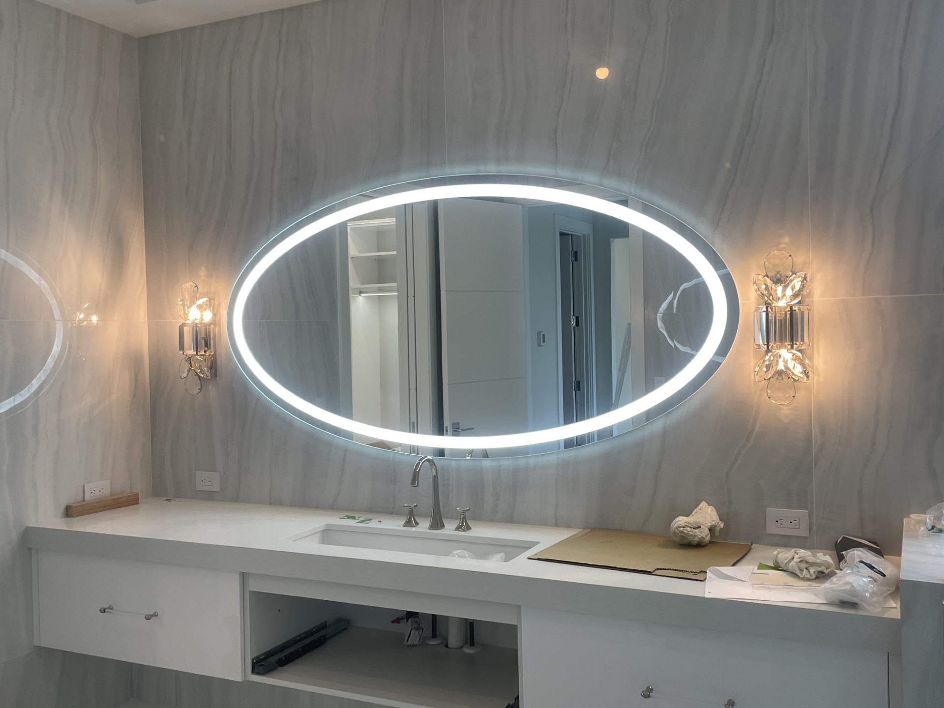 Custom-cut glass mirror installed by RG Glass