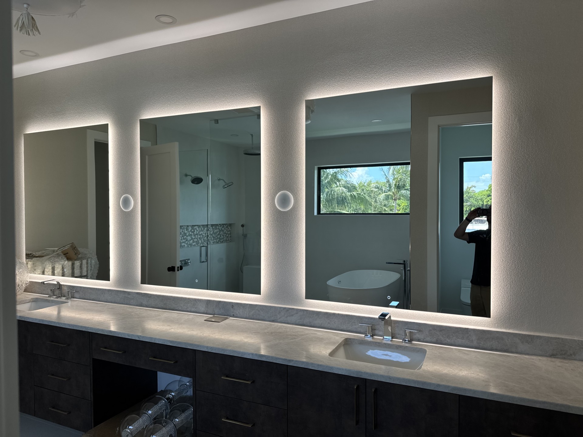 Custom-cut glass mirror installed by RG Glass