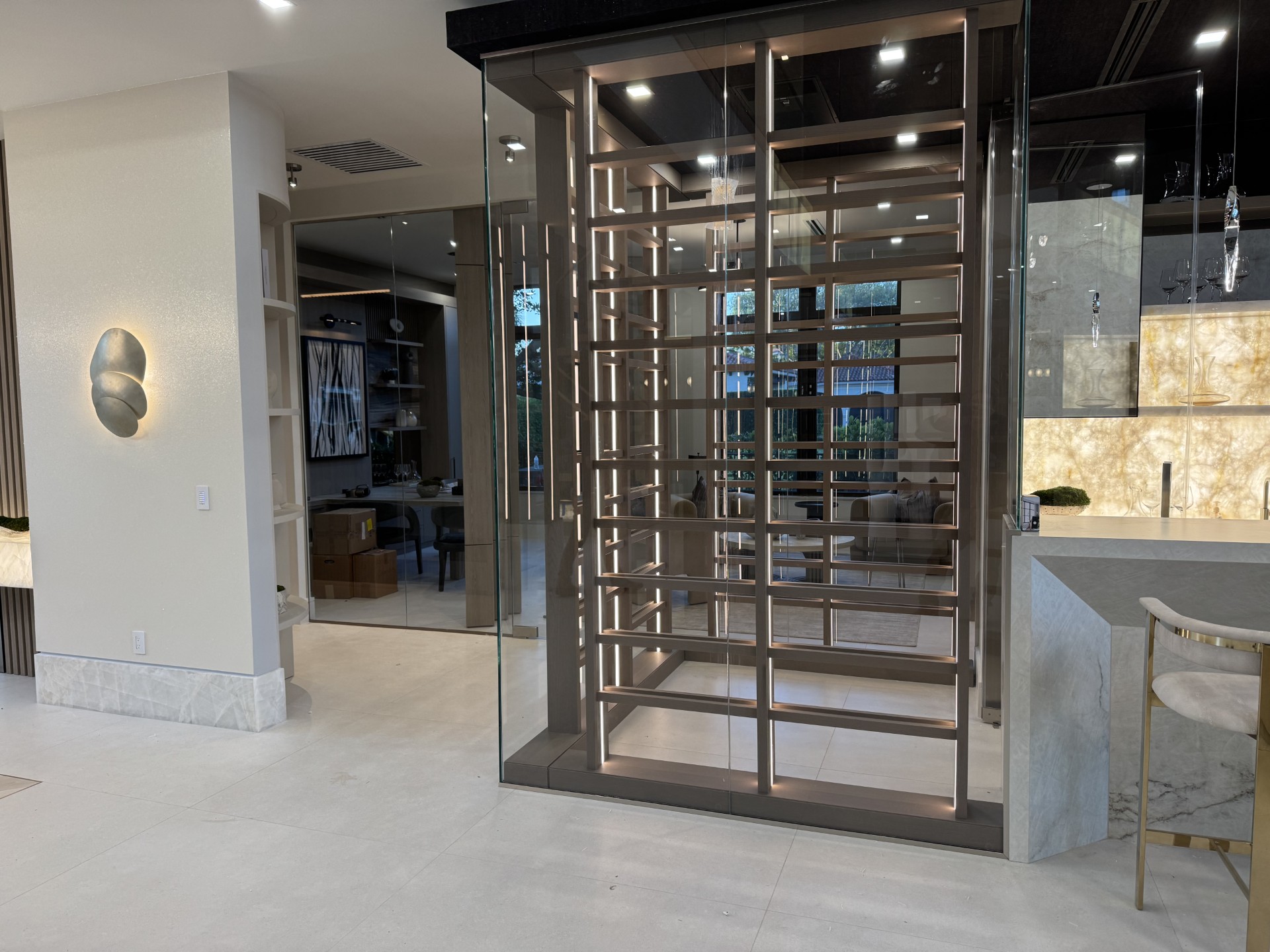 Glass-enclosed wine room by RG Glass